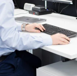 man using mouse and keyboard