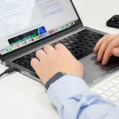 close up of man using laptop