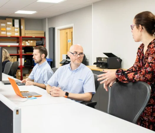 team meeting at desk